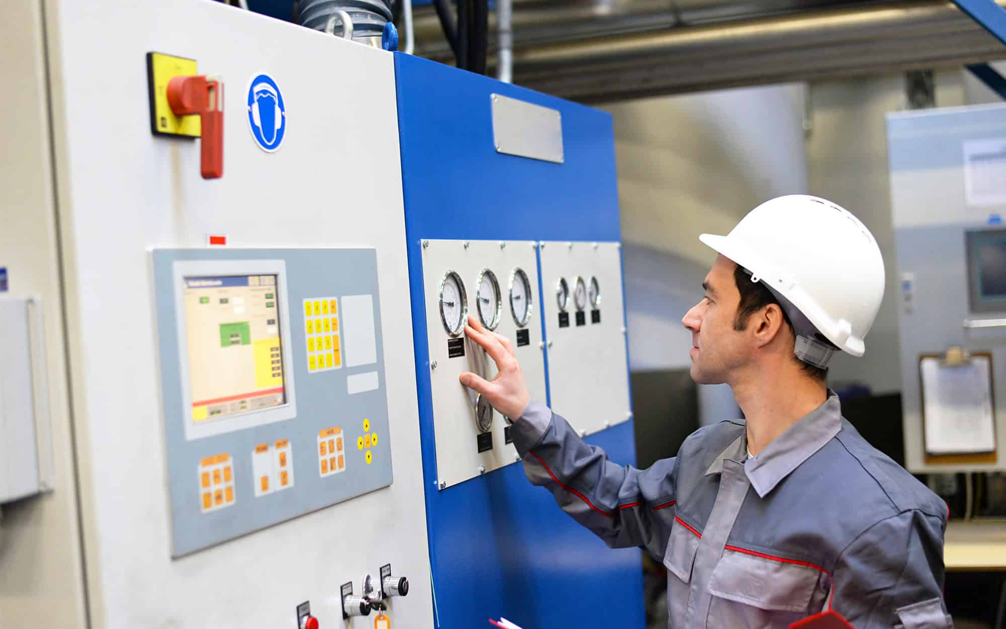 Operator working on commercial HVAC equipment