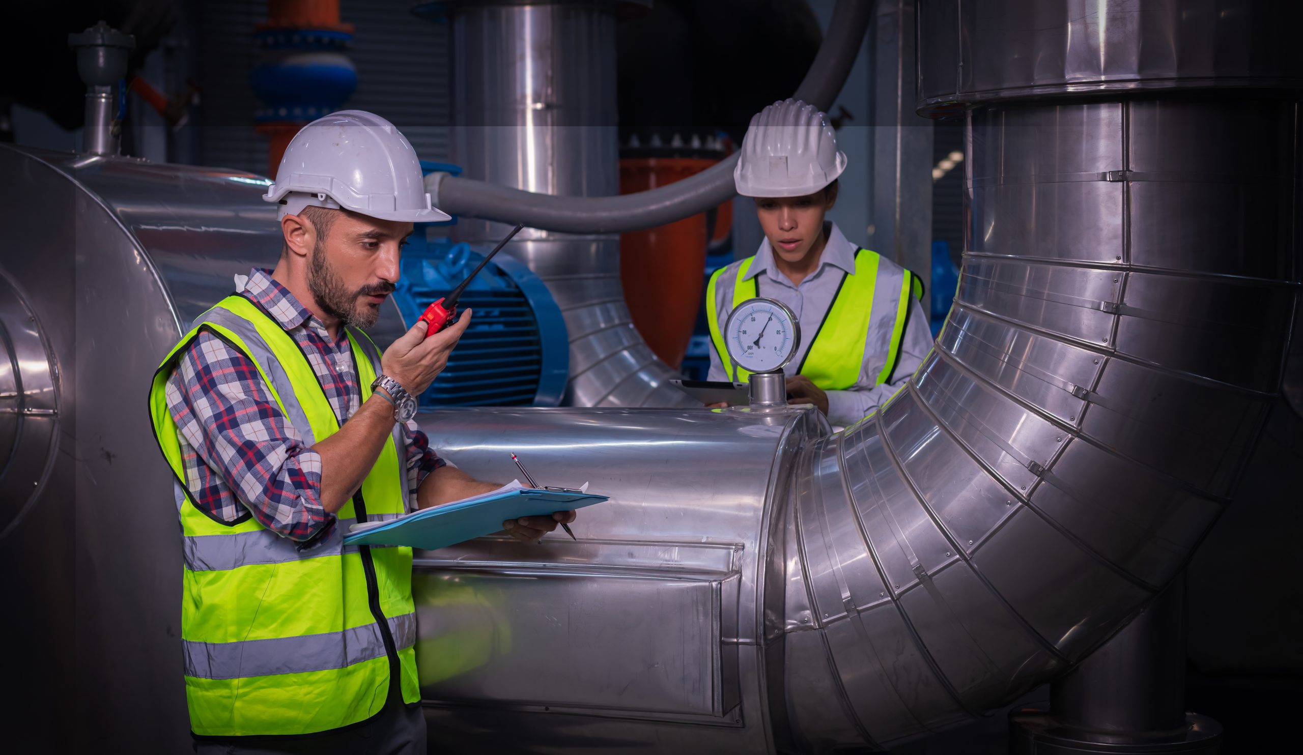 Engineers inspecting a cooling tower